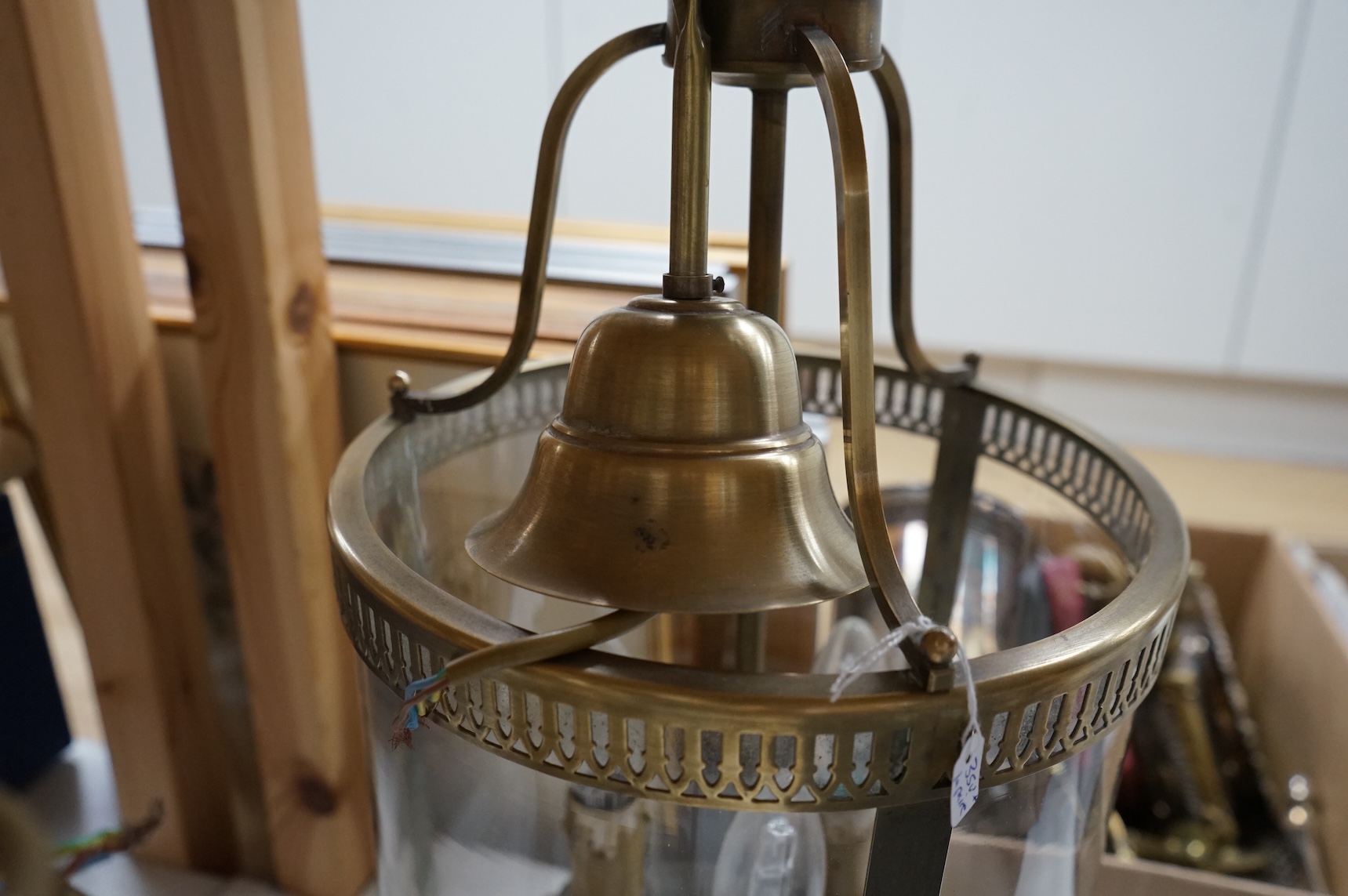 A pair of French brass and glass three light cylindrical lanterns, 65cm high overall